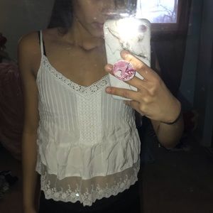 There are holes in the back of the shirt